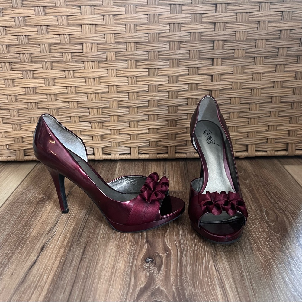 Carlos Santana Pumps.  Maroon color. Women’s size 9. Worn once.